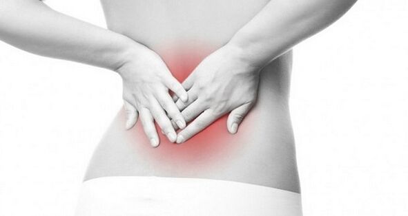 pain in the lower back in a woman
